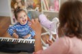 Singing and playing on musical instruments with my mommy